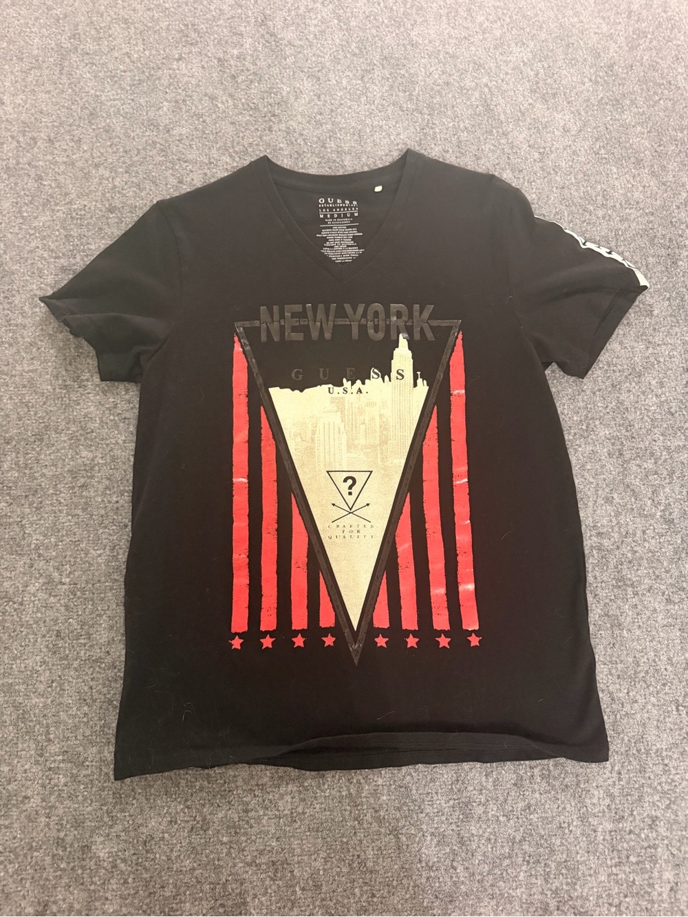 GUESS Men’s Black V-Neck New York Graphic Tee with Red and Cream Accents